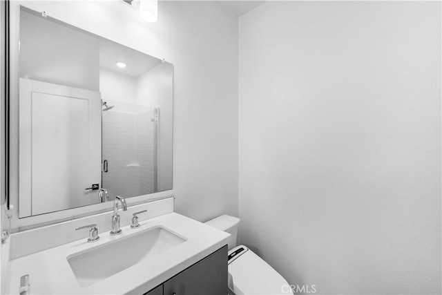 225 Scratch Rd, Covina, CA 91722 - bathroom featuring a stall shower, toilet, and vanity