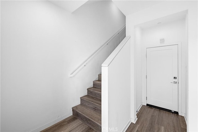225 Scratch Rd, Covina, CA 91722 - stairs featuring wood finished floors and baseboards