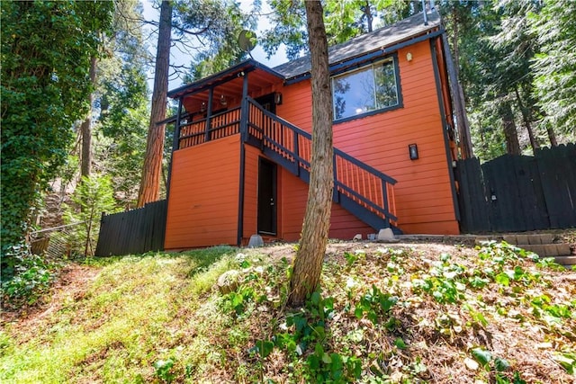 23747 Bowl Rd, Crestline, CA 92325 - back of house with fence, a deck, and stairway