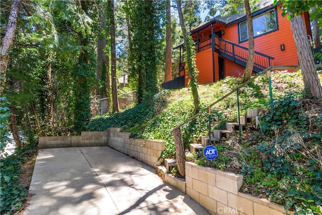 23747 Bowl Rd, Crestline, CA 92325 - view of patio featuring stairs and a deck