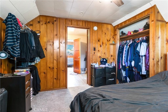 23747 Bowl Rd, Crestline, CA 92325 - carpeted bedroom with wood walls and lofted ceiling