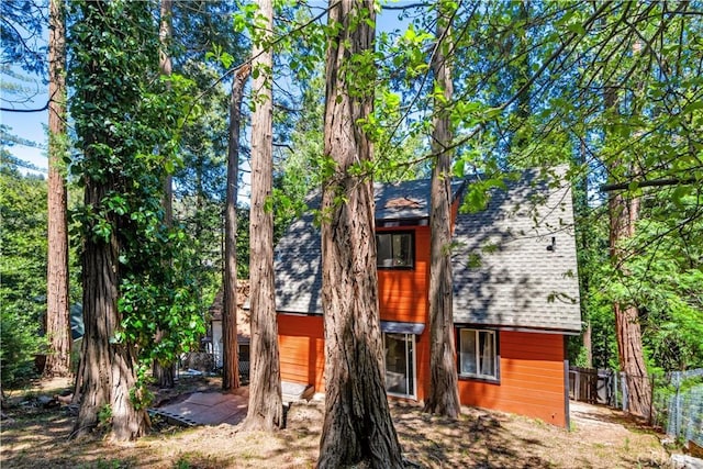 23747 Bowl Rd, Crestline, CA 92325 - rear view of property with fence and a shingled roof