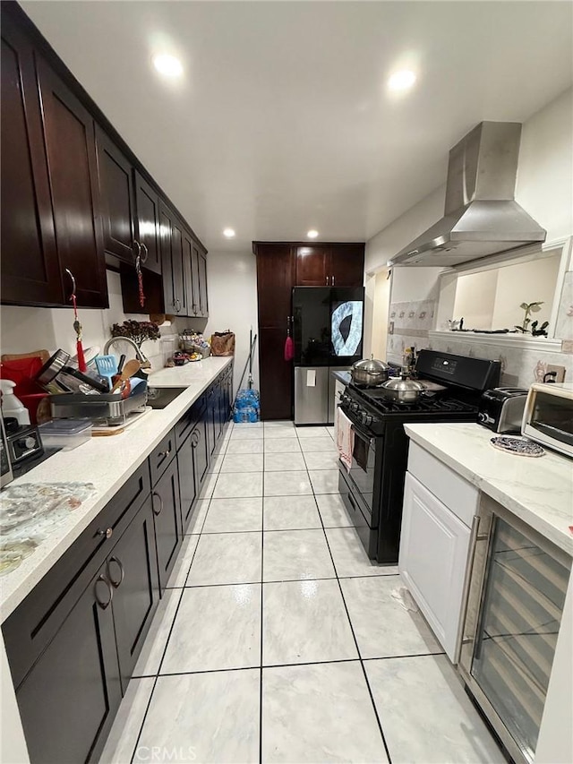 18016 Los Palacios, Rowland Heights, CA 91748 - kitchen featuring range hood, black range with gas stovetop, wine cooler, fridge, and tasteful backsplash