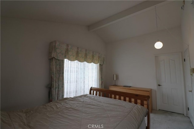 bedroom featuring vaulted ceiling with beams and light carpet