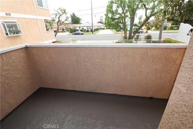 balcony featuring a residential view