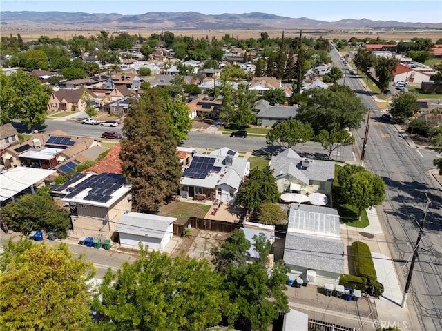 drone / aerial view featuring a mountain view and a residential view
