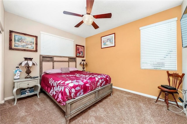 3565 Louer Dr, Lancaster, CA 93536 - bedroom with baseboards, a ceiling fan, and carpet flooring