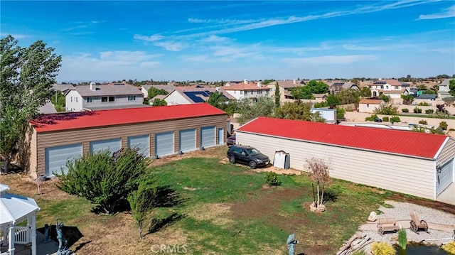 3565 Louer Dr, Lancaster, CA 93536 - exterior space with a gazebo, metal roof, a detached garage, and a residential view
