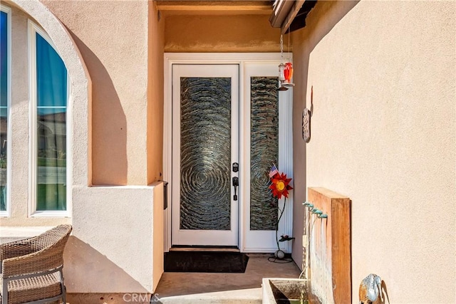 3565 Louer Dr, Lancaster, CA 93536 - doorway to property featuring stucco siding