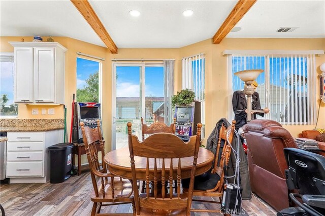 3565 Louer Dr, Lancaster, CA 93536 - dining space with light wood finished floors, recessed lighting, visible vents, and beam ceiling