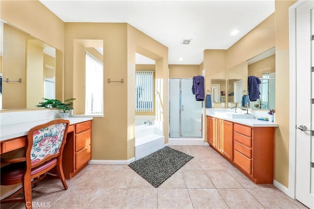 3565 Louer Dr, Lancaster, CA 93536 - full bathroom featuring a shower stall, visible vents, baseboards, a garden tub, and vanity