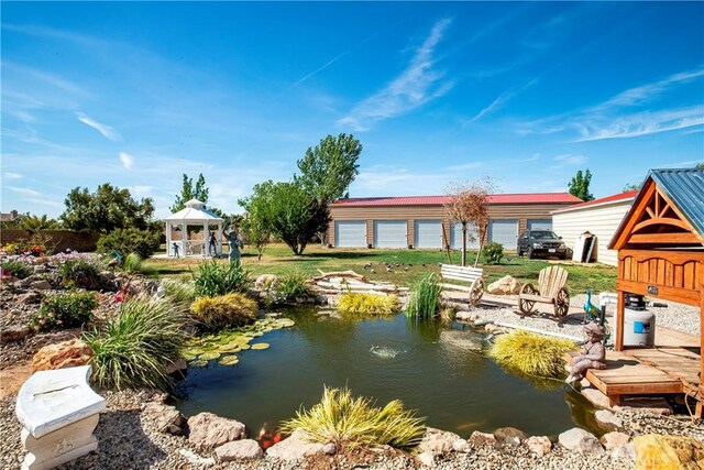 3565 Louer Dr, Lancaster, CA 93536 - exterior space with a gazebo and a garden pond