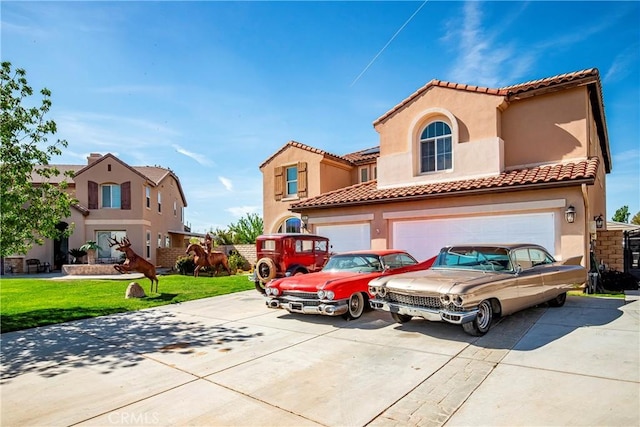 3565 Louer Dr, Lancaster, CA 93536 - mediterranean / spanish home featuring concrete driveway, a front lawn, a garage, and stucco siding