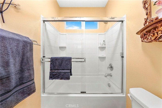 3565 Louer Dr, Lancaster, CA 93536 - full bathroom featuring bath / shower combo with glass door and toilet