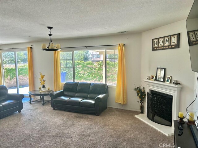 6974 Canterra Way, Fontana, CA 92336 - living room featuring carpet flooring, a textured ceiling, and a fireplace with raised hearth