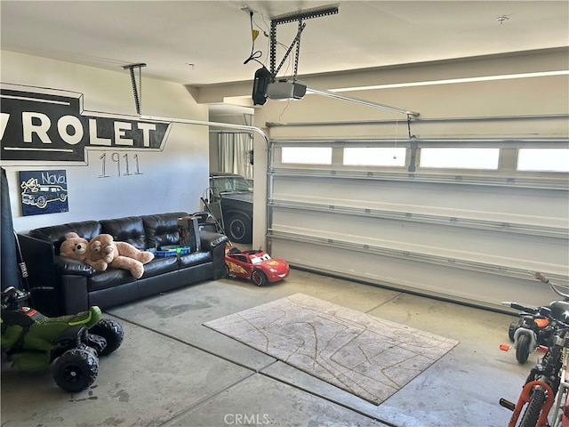 6974 Canterra Way, Fontana, CA 92336 - garage featuring a garage door opener