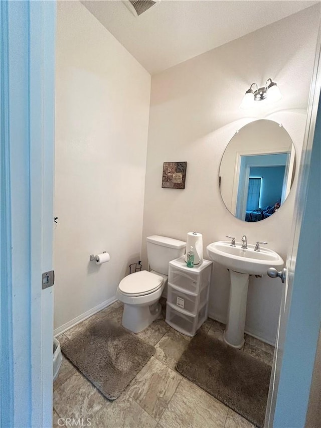 6974 Canterra Way, Fontana, CA 92336 - bathroom with toilet and baseboards