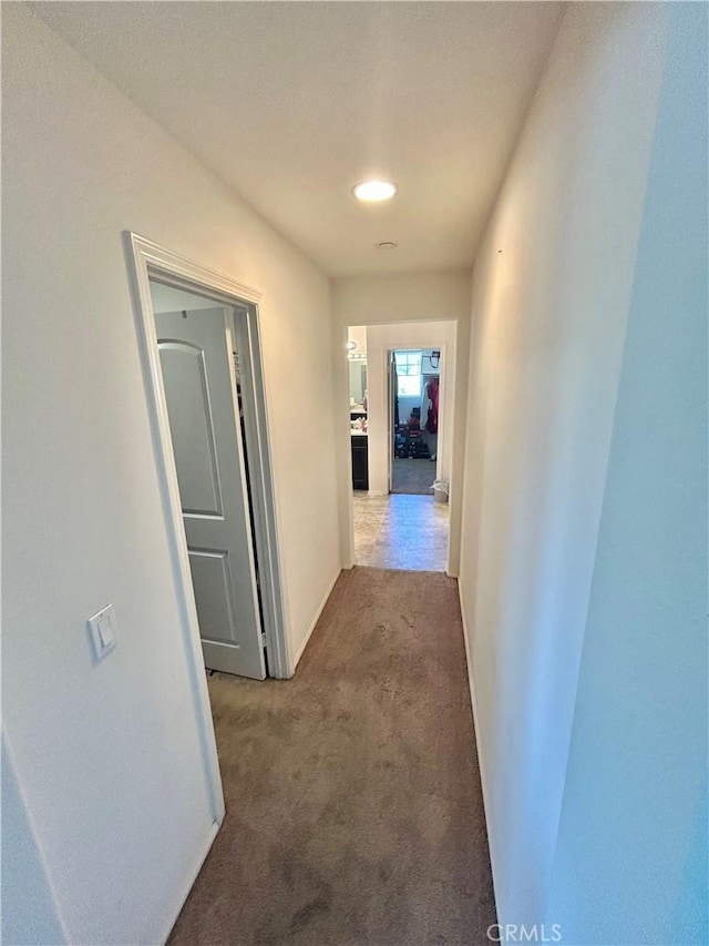 6974 Canterra Way, Fontana, CA 92336 - hallway with light colored carpet