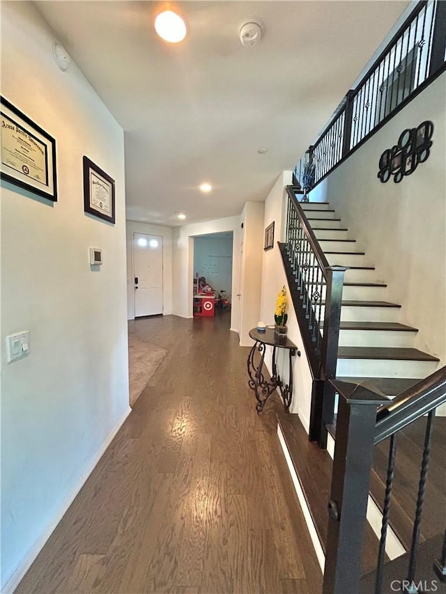 6974 Canterra Way, Fontana, CA 92336 - hall featuring wood finished floors, stairs, and recessed lighting