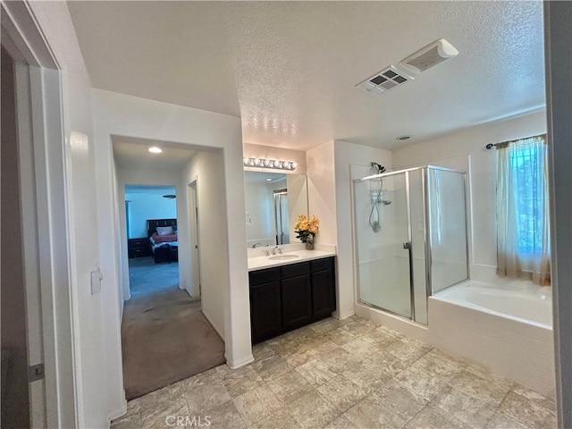 6974 Canterra Way, Fontana, CA 92336 - bathroom featuring a shower stall, vanity, a bath, and a textured ceiling
