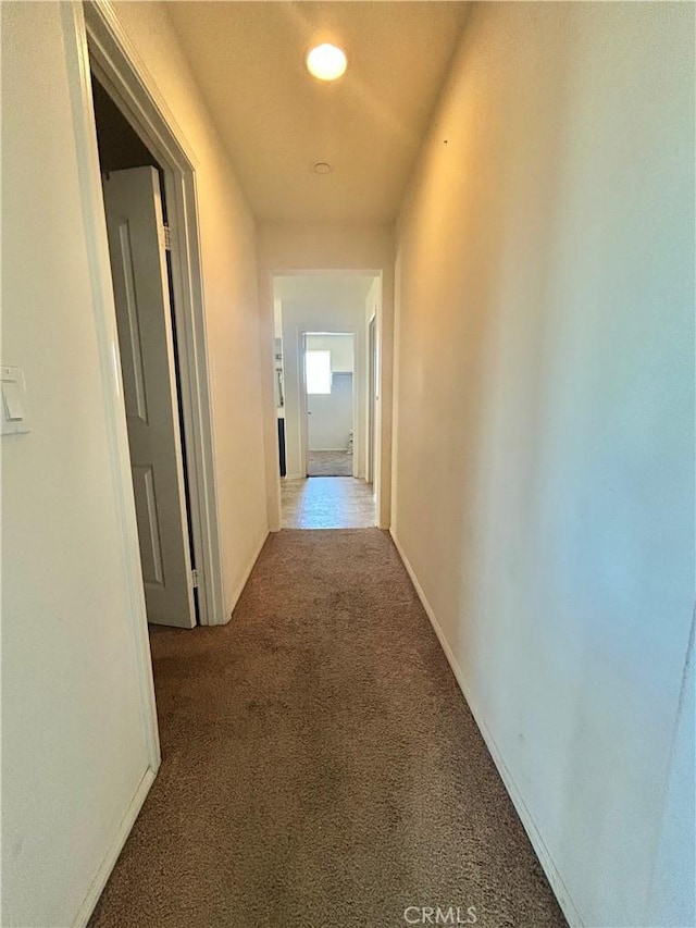 6974 Canterra Way, Fontana, CA 92336 - hallway featuring carpet floors