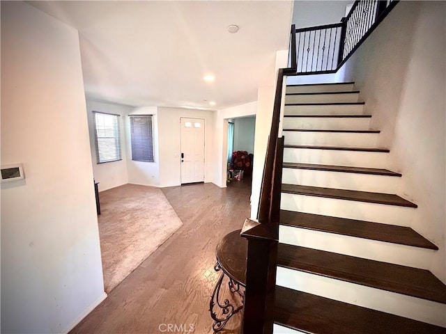 6974 Canterra Way, Fontana, CA 92336 - entryway featuring wood finished floors, stairway, and recessed lighting