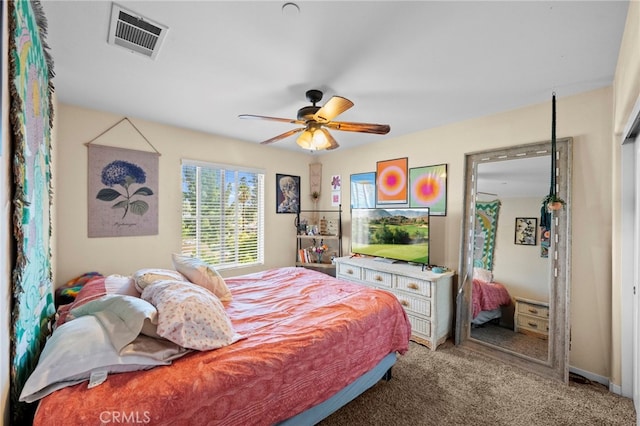 bedroom with ceiling fan, carpet flooring, and visible vents