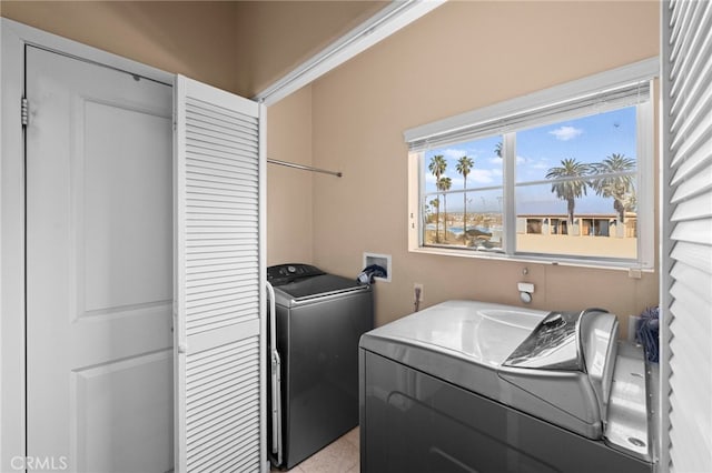 laundry area featuring laundry area and washer and clothes dryer