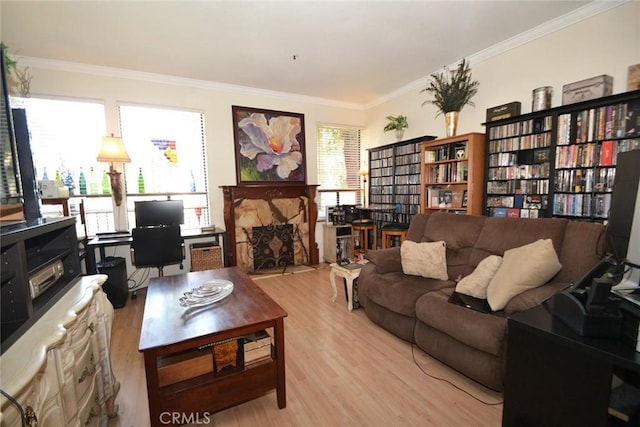 living room featuring crown molding and wood finished floors