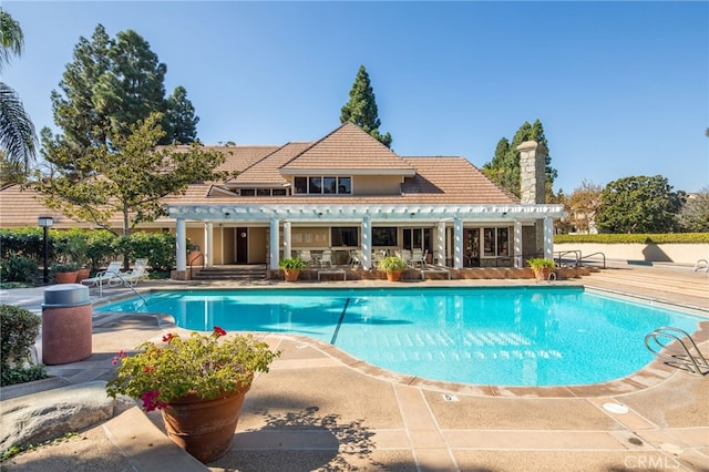 view of pool with a patio area and a fenced in pool