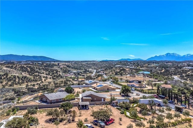7045 Oak Hill Rd, Oak Hills, CA 92344 - drone / aerial view with a mountain view