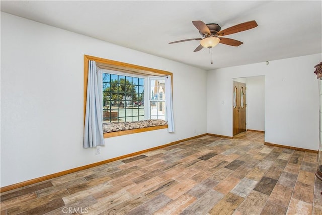 7045 Oak Hill Rd, Oak Hills, CA 92344 - empty room with visible vents, baseboards, a ceiling fan, and wood finished floors