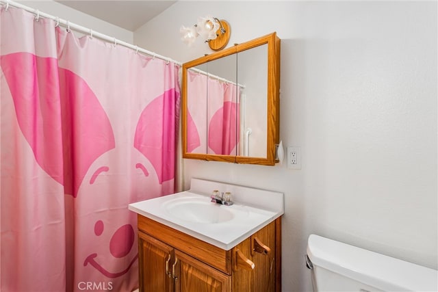 7045 Oak Hill Rd, Oak Hills, CA 92344 - bathroom featuring toilet, curtained shower, and vanity