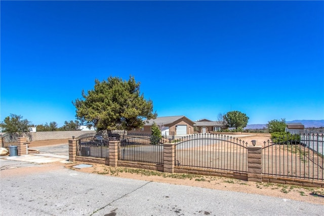 7045 Oak Hill Rd, Oak Hills, CA 92344 - view of front of house with fence
