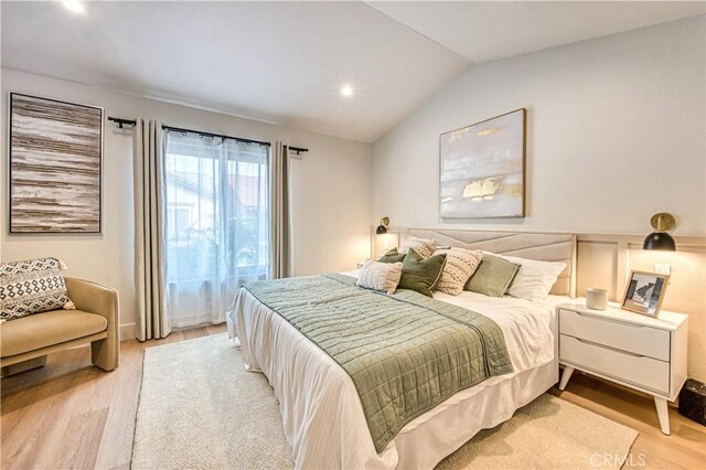 27695 Via Turina, Mission Viejo, CA 92692 - bedroom with wainscoting, vaulted ceiling, light wood-style floors, and recessed lighting