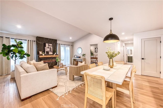 27695 Via Turina, Mission Viejo, CA 92692 - dining area featuring recessed lighting, plenty of natural light, vaulted ceiling, and light wood-style floors