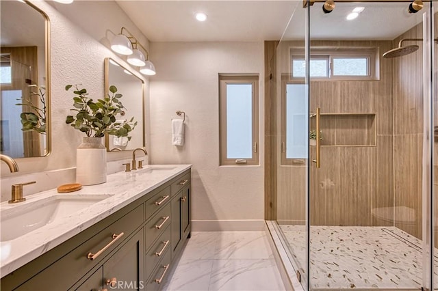 27695 Via Turina, Mission Viejo, CA 92692 - full bath with marble finish floor, a sink, double vanity, and a stall shower