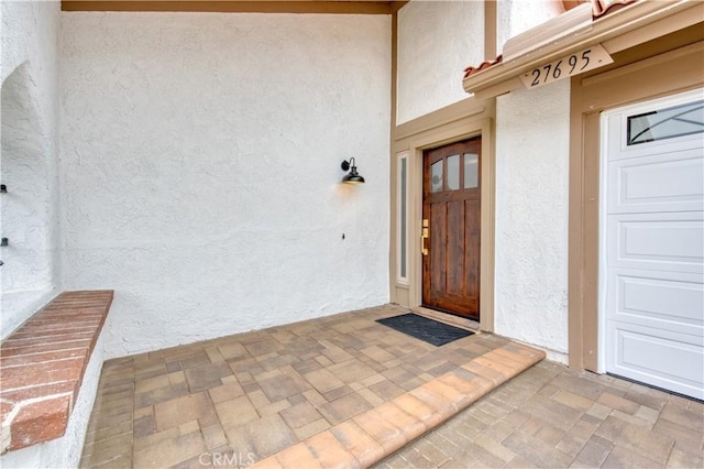 27695 Via Turina, Mission Viejo, CA 92692 - entrance to property with stucco siding