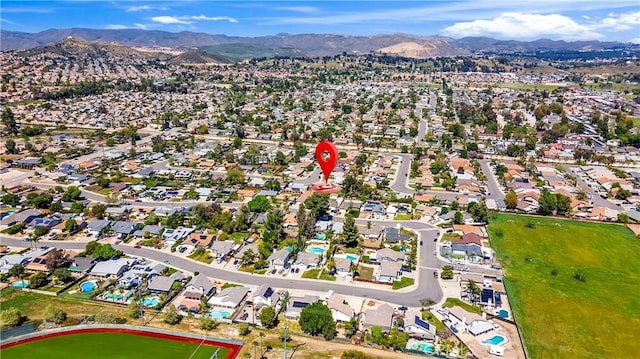 bird's eye view featuring a residential view and a mountain view