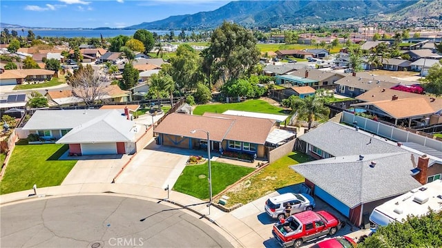 aerial view with a mountain view and a residential view