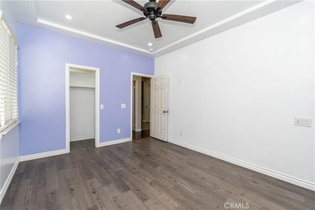 27321 Carlton Oaks St, Murrieta, CA 92562 - unfurnished bedroom featuring a closet, baseboards, a ceiling fan, recessed lighting, and wood finished floors