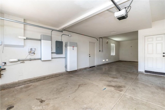 27321 Carlton Oaks St, Murrieta, CA 92562 - garage featuring a garage door opener, baseboards, and electric panel
