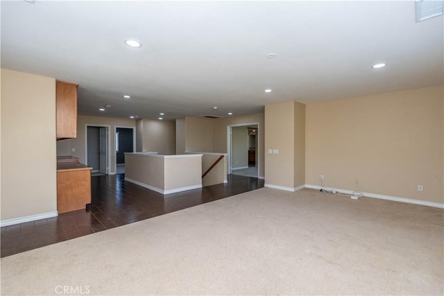 27321 Carlton Oaks St, Murrieta, CA 92562 - unfurnished living room featuring dark carpet, visible vents, recessed lighting, baseboards, and dark wood-style floors