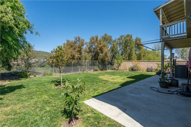 27321 Carlton Oaks St, Murrieta, CA 92562 - view of yard featuring a patio area, a fenced backyard, and central AC