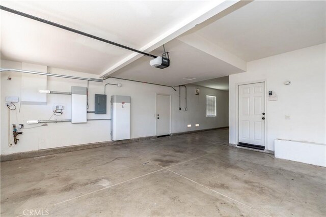 27321 Carlton Oaks St, Murrieta, CA 92562 - garage with a garage door opener, baseboards, and electric panel
