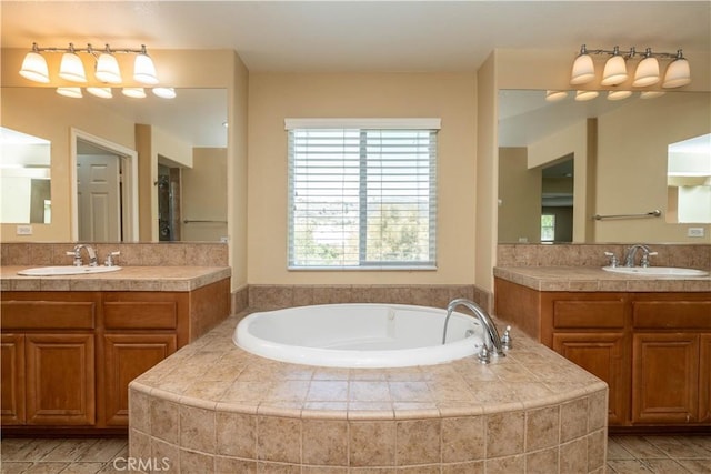 27321 Carlton Oaks St, Murrieta, CA 92562 - full bath featuring two vanities, a bath, and a sink