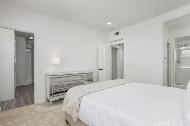 201 Native, Irvine, CA 92618 - bedroom with light carpet and recessed lighting