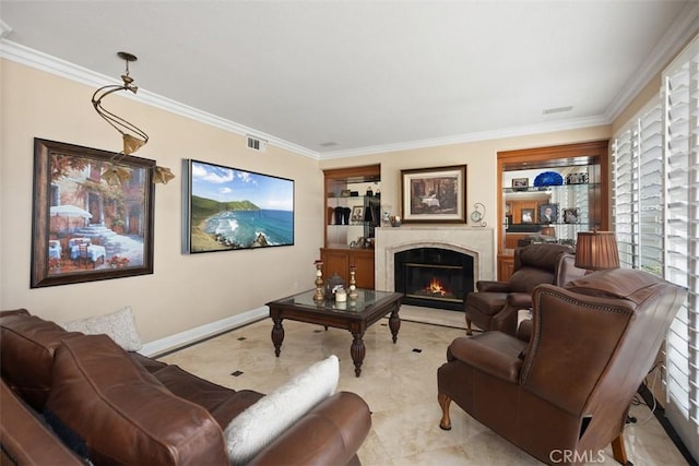 living room featuring visible vents, baseboards, built in features, a high end fireplace, and ornamental molding