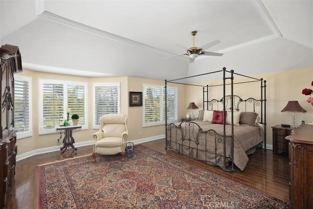 bedroom with baseboards and wood finished floors