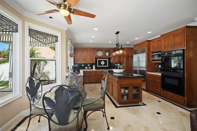 kitchen featuring tasteful backsplash, brown cabinetry, glass insert cabinets, appliances with stainless steel finishes, and ornamental molding